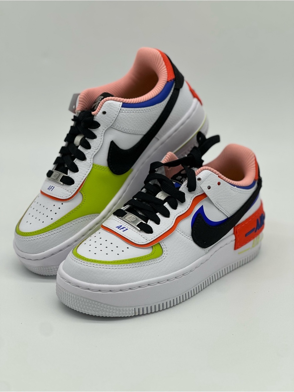Nike Women's White Sneakers with Black, Neon Green & Pink Accents